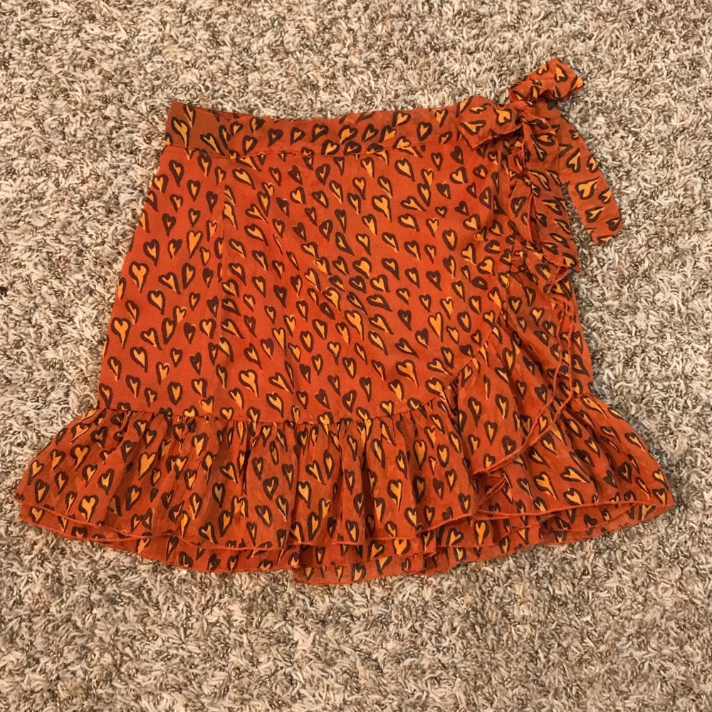 Urban Outfitters heart print, bow tie side, ruffle mini skirt